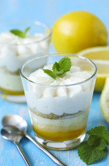 Limoncello - italian Dessert.  Lemon Cheesecake Mousse with Whipped Cream in cups. Summer dessert.