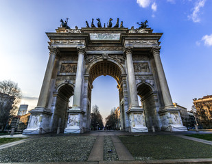 Fototapeta na wymiar Porta Sempione of Milan during a sunny day,Lombardia, Italy. Triumphal gate called Arch of Peace.