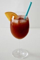 sex on the beach cocktail with vodka, peach, cranberry and orange juice
