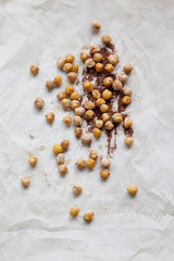 Tasty roasted chickpeas with spices, view overhead.
