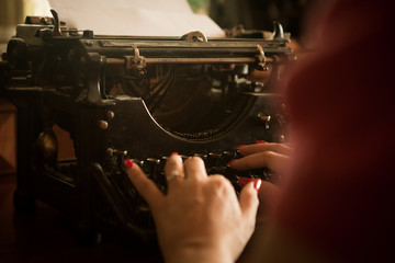 Copywriter hands on a typewriter.