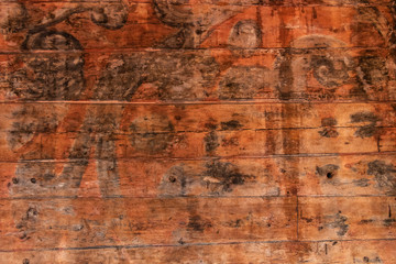 Old wood pattern background with an old paintings on it