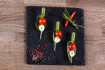Canape caprese with oil
