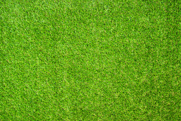 Beautiful Green artificial grass background vignette or the naturally walls texture Ideal for use...
