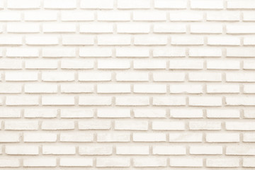 Cream and white brick wall texture background. Brickwork or stonework flooring interior rock old pattern clean concrete grid uneven bricks design stack.