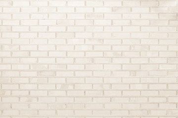 Cream and white brick wall texture background. Brickwork or stonework flooring interior rock old...