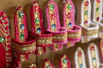Perspective close-up traditional colorful wooden slipper figures shot at Izmir in Turkey