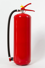Obraz premium Chemical Fire extinguisher red tank isolated on white background