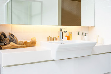 Interior of bathroom with sink basin faucet and mirror. Modern design of bathroom