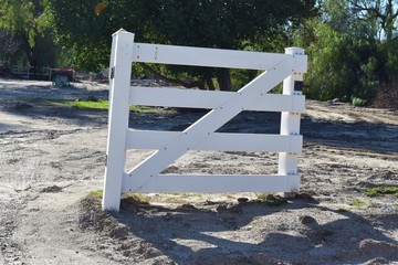 White wooden gate with no fence