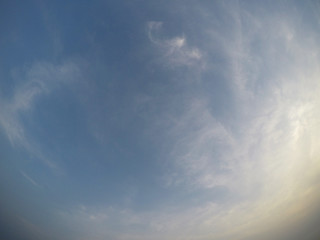 An image of a dramatic clouds cape in a dark blue tropical sky. Taken with a wide angle lens 