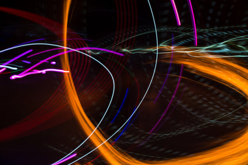 Fototapeta premium Abstract background with color lines. Bright abstract pattern in a color different lines on a black