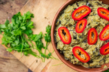 Vegetables eggplant pkhali served as salad in bowl. Georgian traditional food snack appetizer. Vegan vegetarian healthy food.