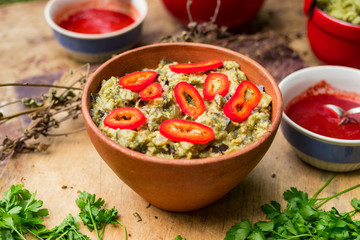 Vegetables eggplant pkhali served as salad in bowl. Georgian traditional food snack appetizer. Vegan vegetarian healthy food.