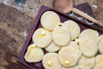 Cooked khachapuri bread with suluguni cheese and butter. Georgian traditional food.