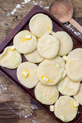 Cooked khachapuri bread with suluguni cheese and butter. Georgian traditional food.