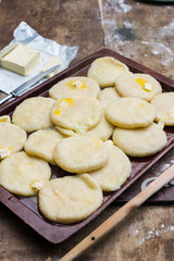 Cooked khachapuri bread with suluguni cheese and butter. Georgian traditional food.