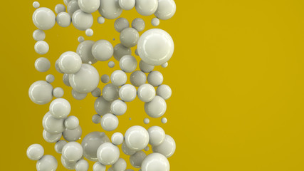 White spheres of random size on yellow background