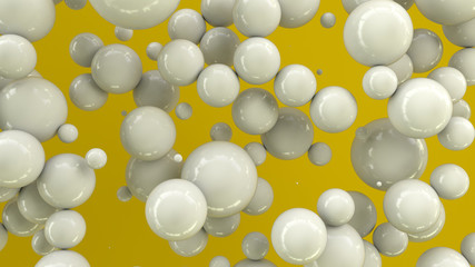 White spheres of random size on yellow background