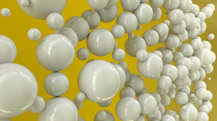 White spheres of random size on yellow background