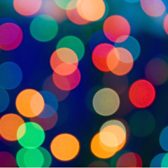 Christmas vivid abstract background. Bright spots of christmas lights. Bokeh.