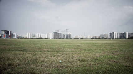 Building in construction with grass foreground 