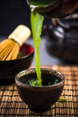 Pouring green tea, drinking tea ceremony