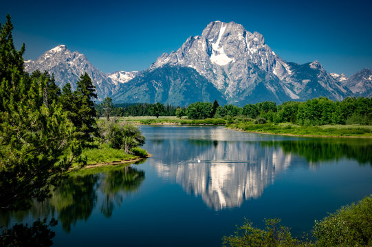 Reflections of the Tetons in the Snake River in Grand Teton National Park