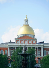  facade view of MA state house in sunny day