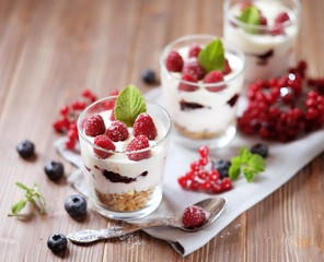 Healthy breakfast with yogurt and granola. Top view. Close up.