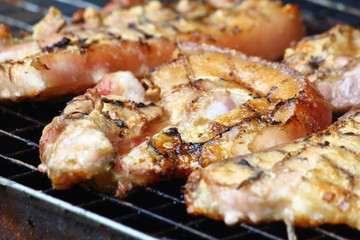 delicious food pork grilling on hot charcoal