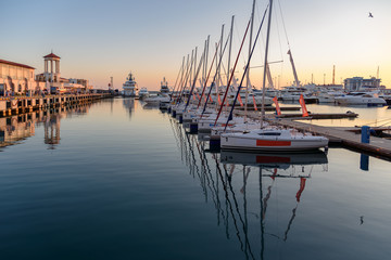 Yachts, boats, ships, vessels in the harbor of Seaport pf Sochi, Russia. Marina for yacht....