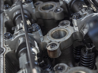 engine closeup parts, valves, bolts