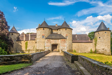 Fototapeta na wymiar View at the entrance to Castle of Corroy le Chateau in the province of Namur - Belgium
