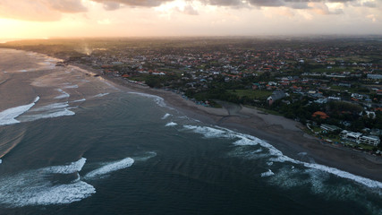 Sunset over sand beach of Changgu area,Bali island,Indonesia