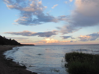 The sea shore in the evening twilight, the sunset begins, the landscape