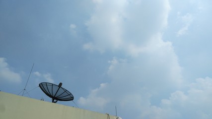 Satellite with Cloud and Blue sky