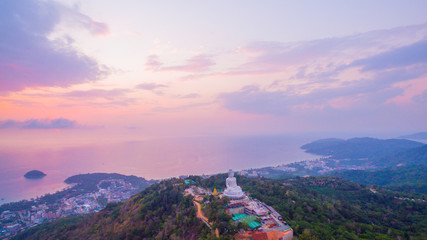aerial view sweet sunset at Phuket big Buddha. .Phuket Big Buddha statue is one of the island most important and revered landmarks on the island. © Narong Niemhom