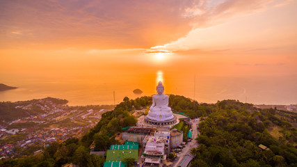 aerial view sweet sunset at Phuket big Buddha. .Phuket Big Buddha statue is one of the island most important and revered landmarks on the island. © Narong Niemhom