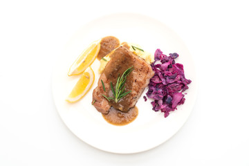 pork steak with red cabbage and mashed potatoes