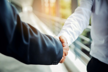 Two businessman shaking hands