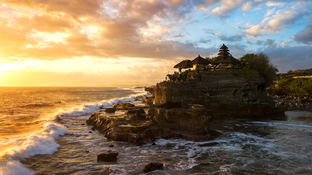 Tanah Lot in sunrise colors,the most famous temple at Bali island,Indonesia