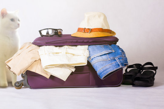Travel bag with clothes.