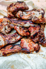 juicy pieces of barbeque shish kebab on thin bread