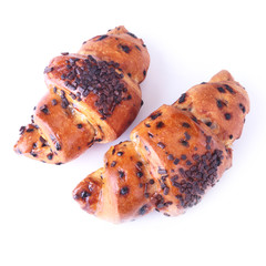 Crispy fresh croissant isolated on white background, selective focus.