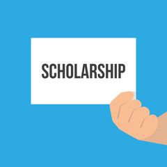 Man showing paper SCHOLARSHIP text
