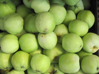 Green apples in a close-up box