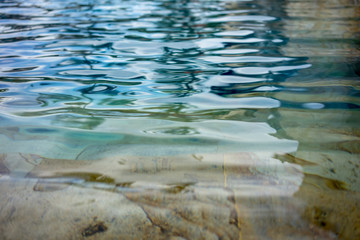 Swimming pool, close up, ripple water effect