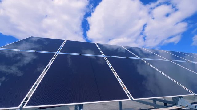 Solar battery construction is functioning on a roof