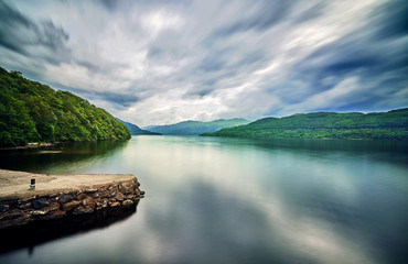 schottish highlands landscape with cloud in the sky.